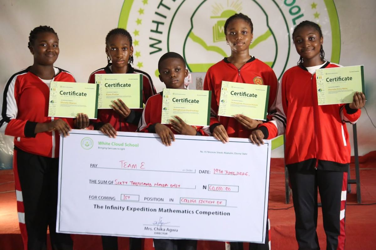 Team E receiving the winners' cheque of the Infinity Expedition Mathematics Competition